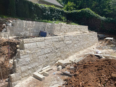 Dayd Masonry stone retaining wall installation in the Dallas–Fort Worth area